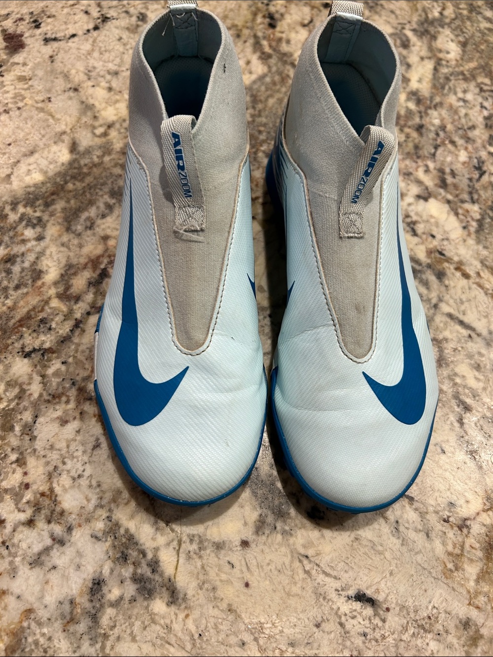 Nike Air Zoom Kids Light Blue Slip-On Soccer Sneakers with Blue Swoosh